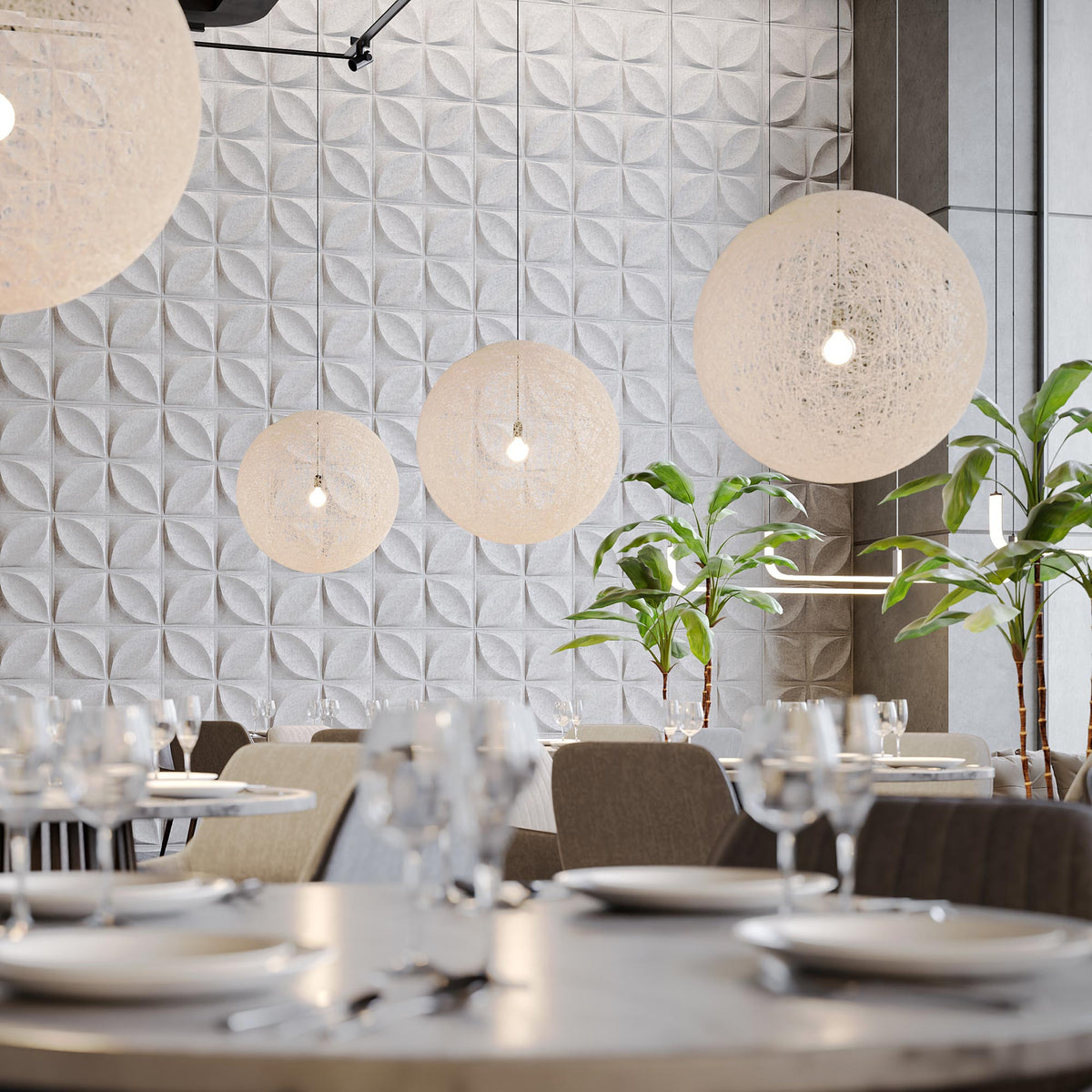 Light gray Chrysalis Harmony3D acoustic felt wall panels in a restaurant with globe pendant lights