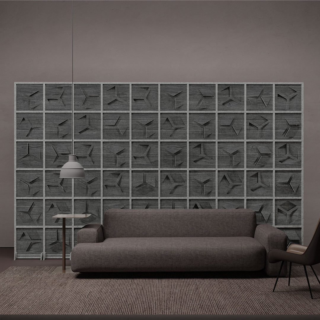 Hex HarmonyBLOKS gray terrazzo acoustic room divider in a lounge.