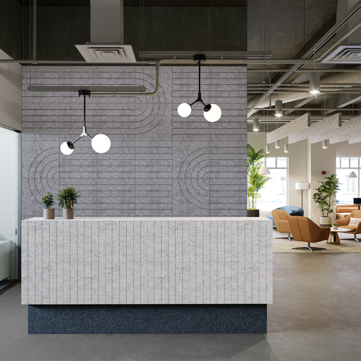 Arc HarmonyCARV acoustic felt wall panels behind a reception desk in a modern commercial interior
