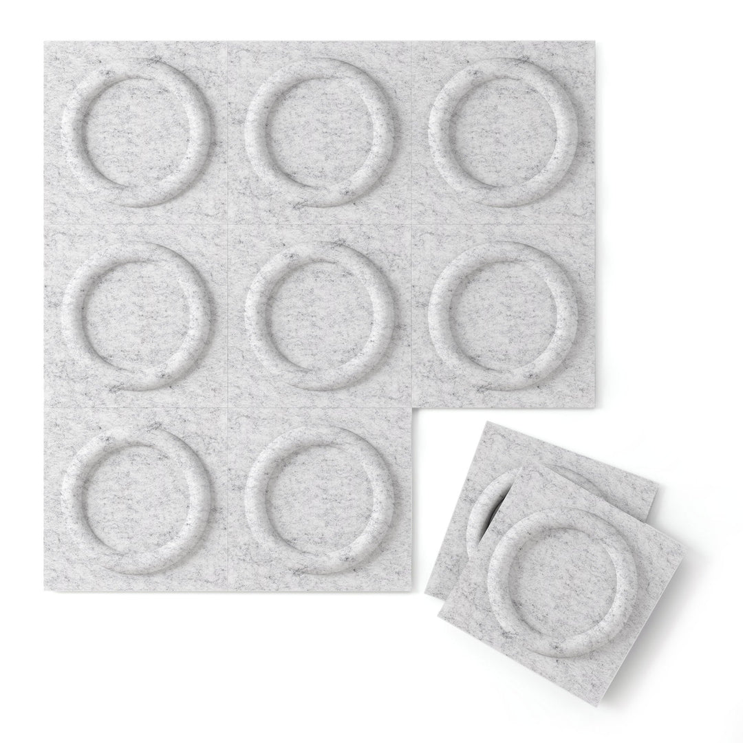 Light gray Halo Harmony3D PET felt 3D acoustic wall panel with a raised ring pattern by Inhabit